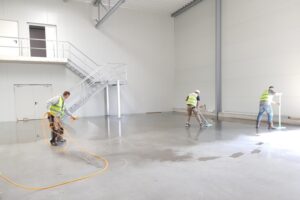 team repairs the floor - field of activity