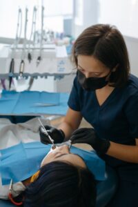 a dentist treating a patient